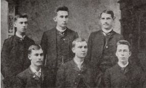 Seated: George R. McVey, Epsilon, Founder; Charter members: Robert E. Downing, P4; William D. Magruder, P5. Standing: Julian H. Pearson, P2; George L. Belcher, P3; John M. Evans, P1.